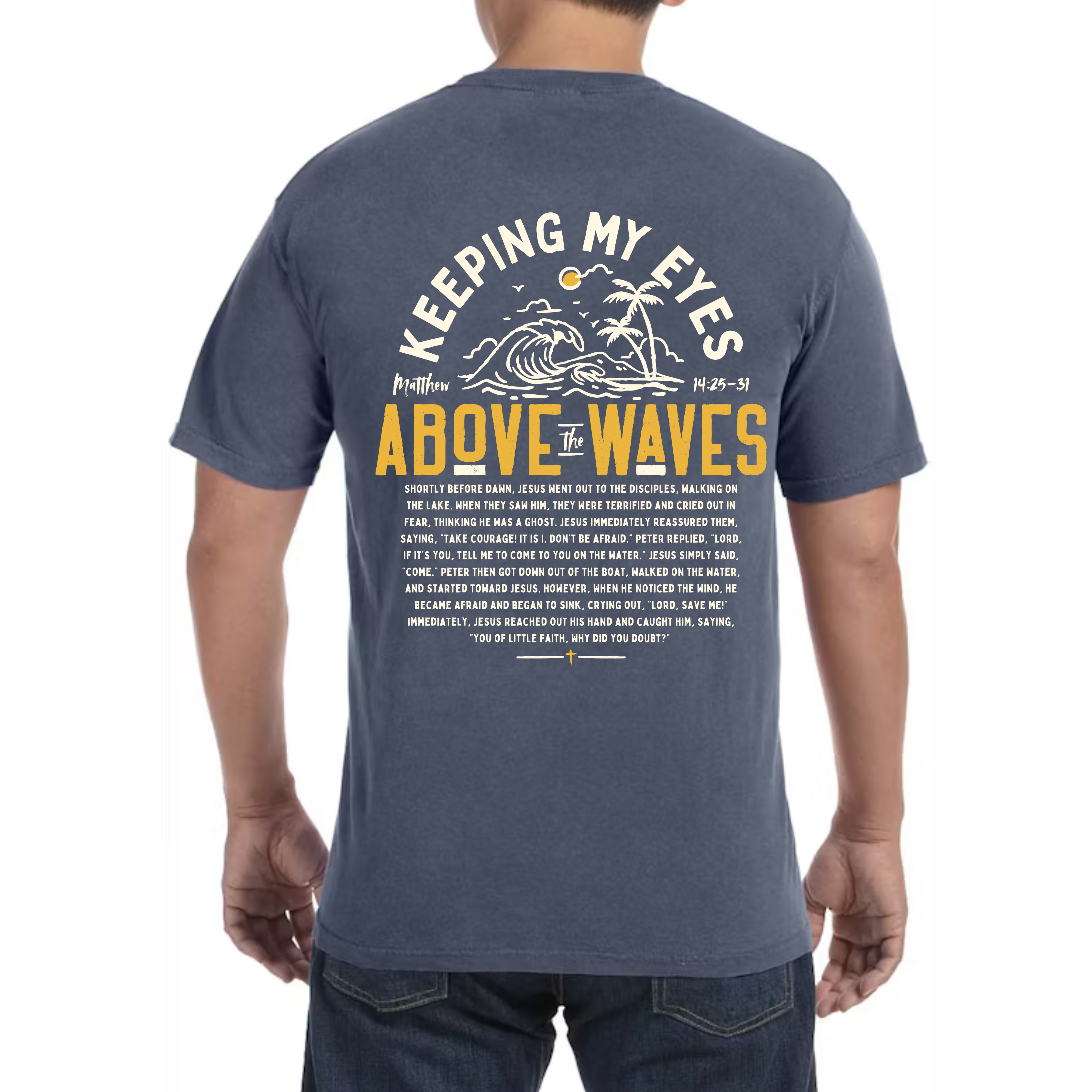 Back view of a Christian t-shirt featuring 'Keeping My Eyes Above the Waves' with Matthew 14:25-31 text and hand-drawn wave illustration.