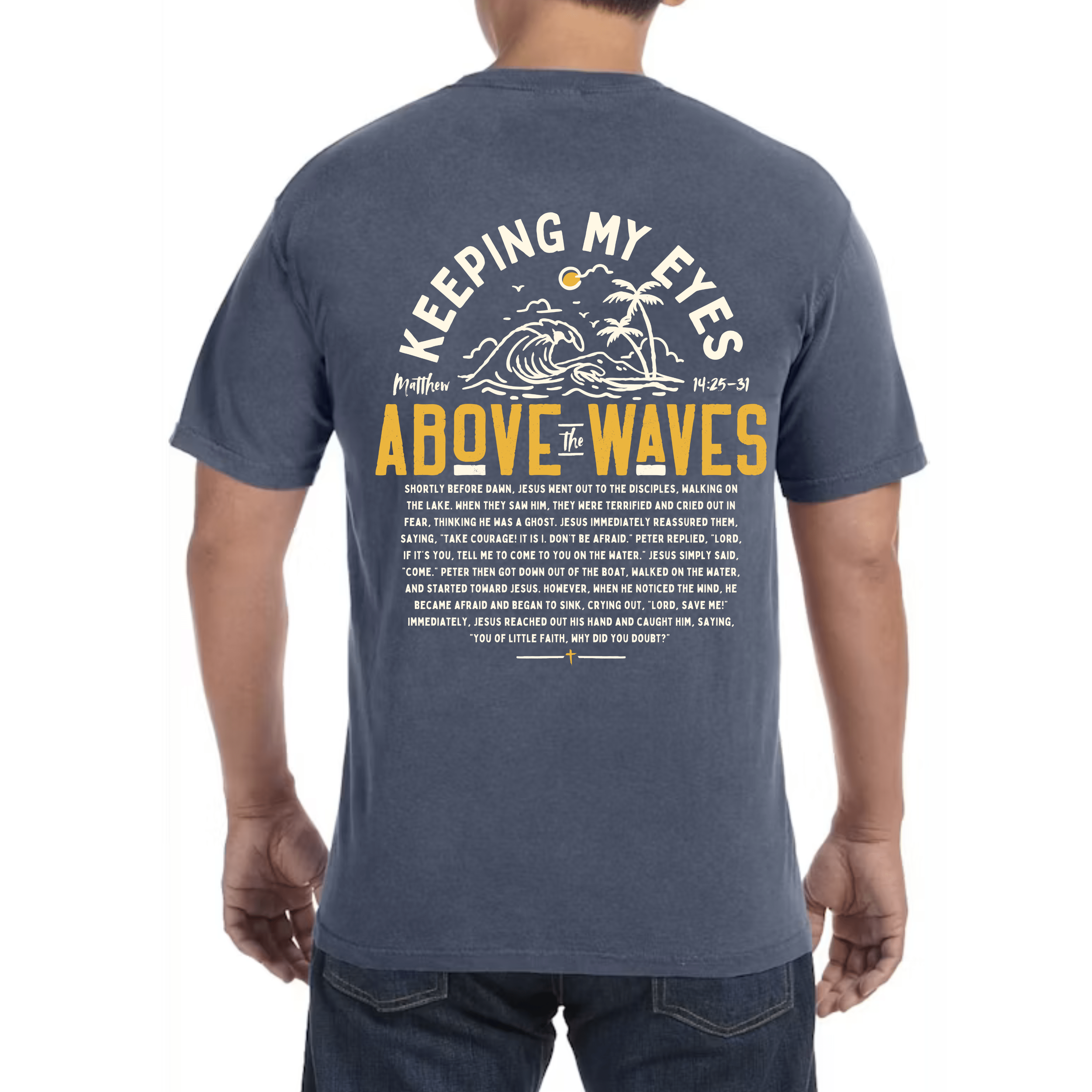 Back view of a Christian t-shirt featuring 'Keeping My Eyes Above the Waves' with Matthew 14:25-31 text and hand-drawn wave illustration.