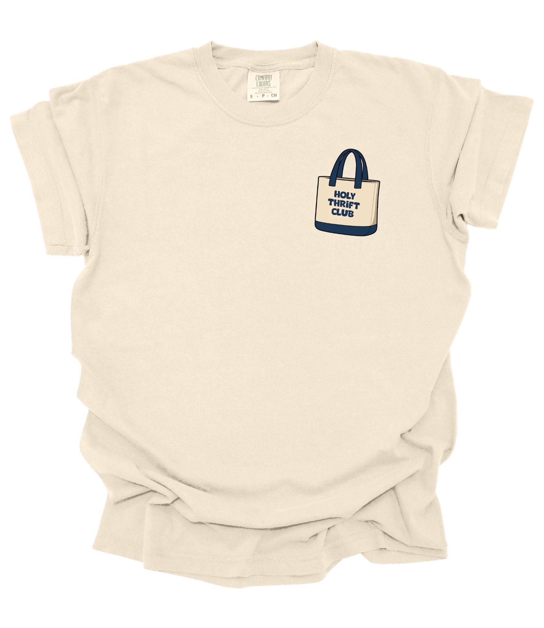 Front of ivory Comfort Colors Christian t-shirt featuring a small Holy Thrift Club tote bag graphic printed on the left chest.