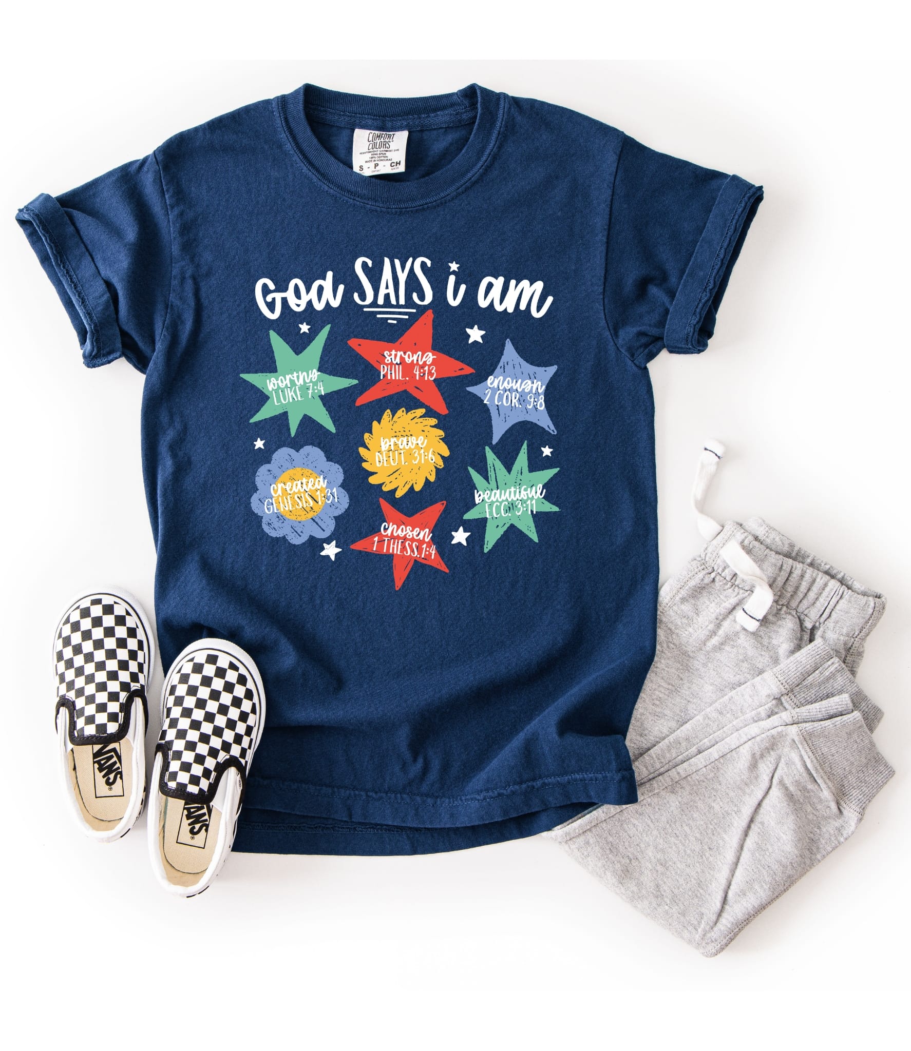 Navy kids' T-shirt with "God Says I Am" printed on front, made by MADE BY YEN, featuring a faith-based design for children.