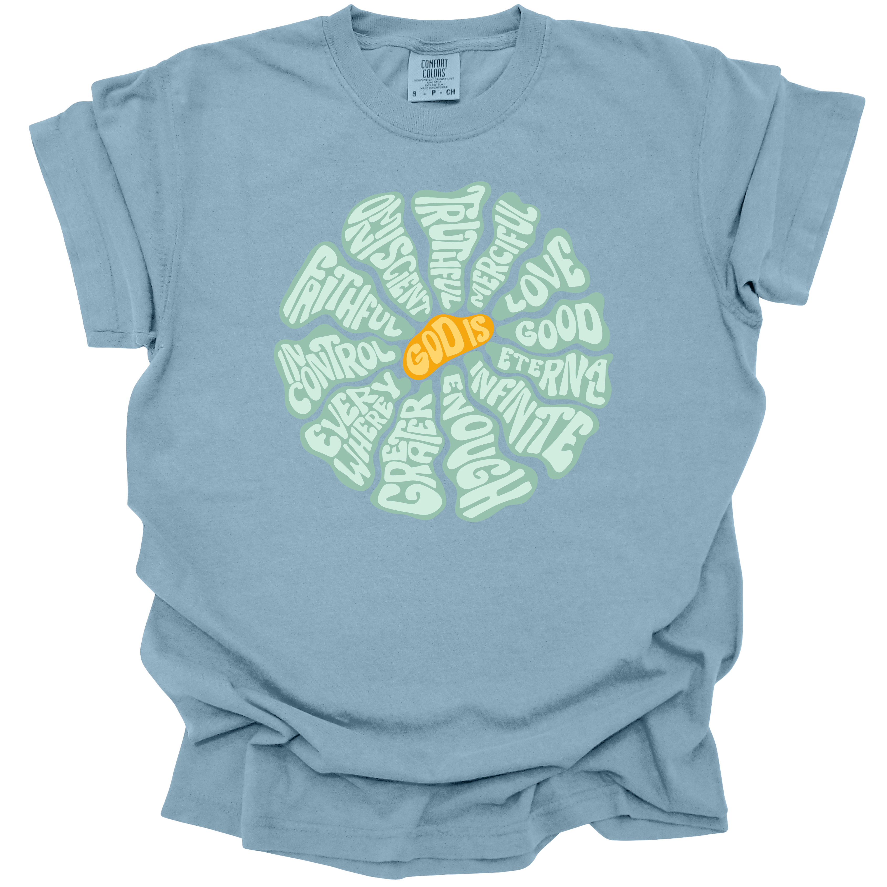 Ice Blue t-shirt with a circular, retro-inspired design featuring the attributes of God, including Faithful, Merciful, Eternal, Good, Infinite, In Control, and More, with the text "God Is" in vibrant orange at the center.