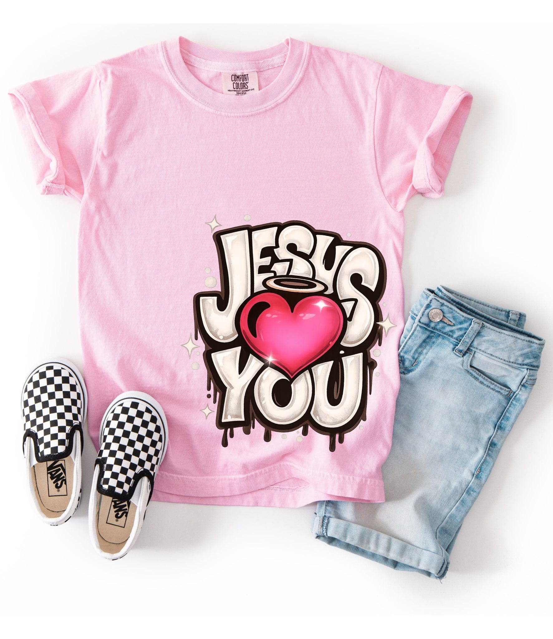 Pink youth Christian t-shirt with “Jesus Loves You” heart design, faith-based kids tee by Made by Yen