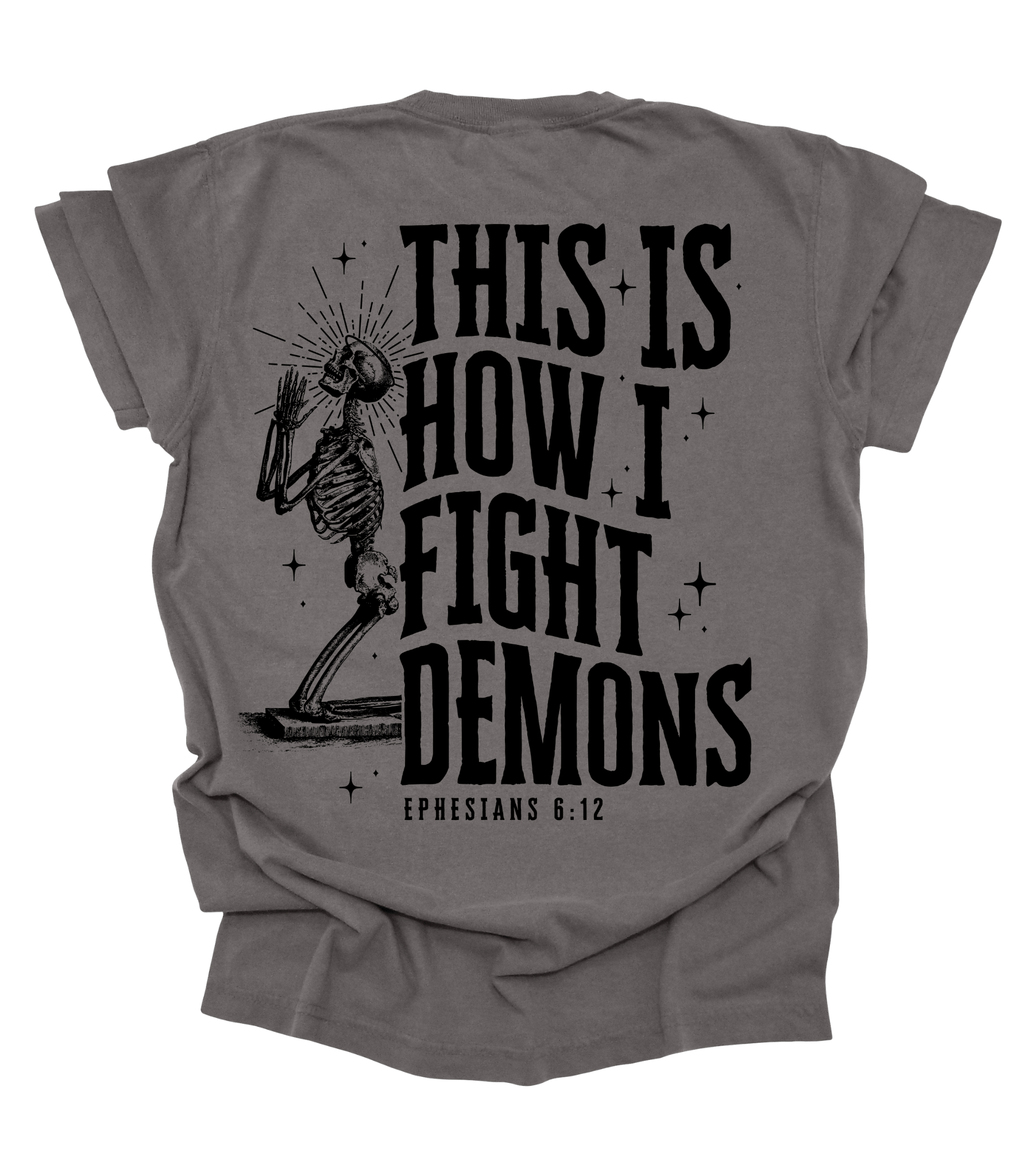 Gray t-shirt with skeleton graphic and text on a white background
