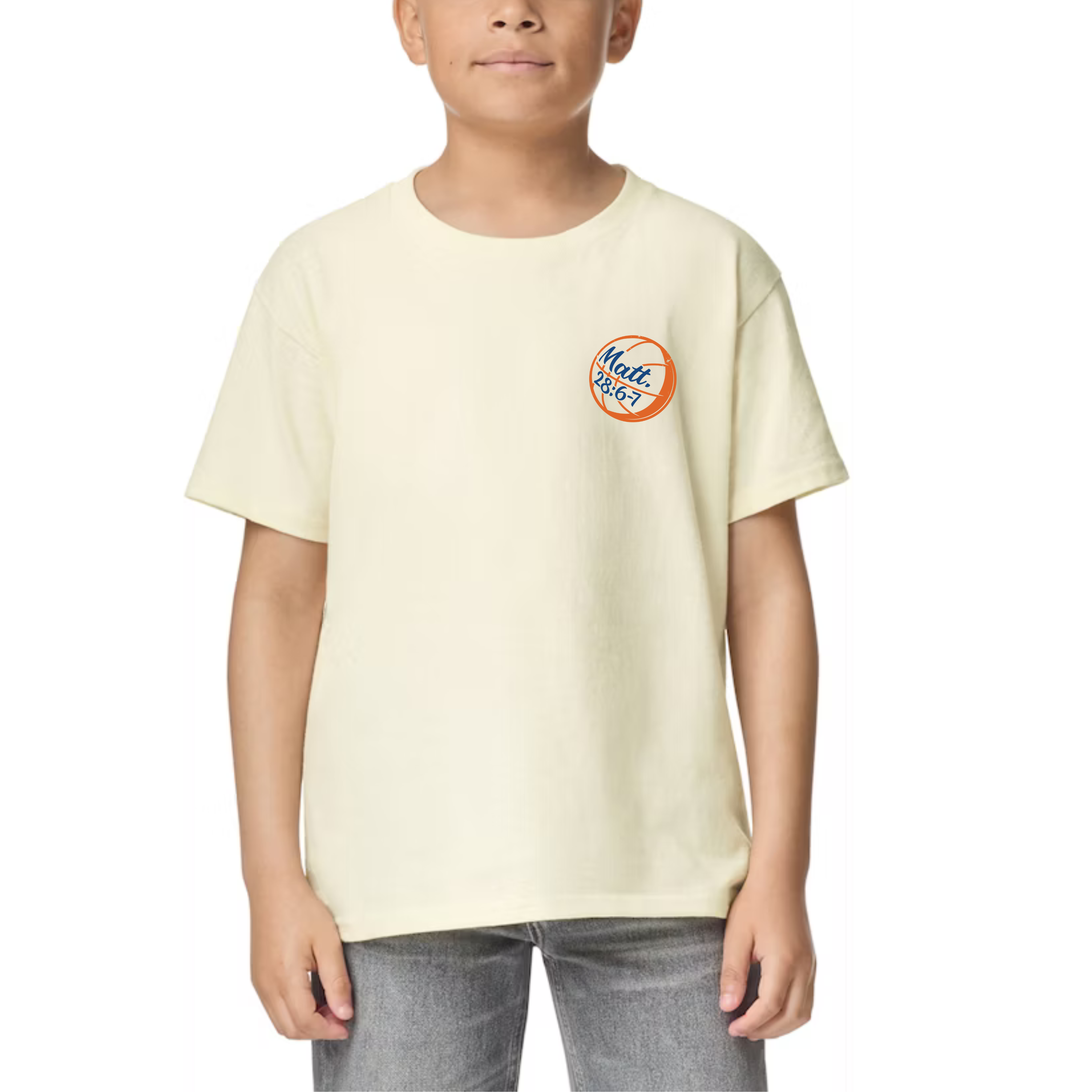 Front view of a natural-colored kids Christian t-shirt with a basketball and 'Matt. 28:6-7' scripture reference on the chest