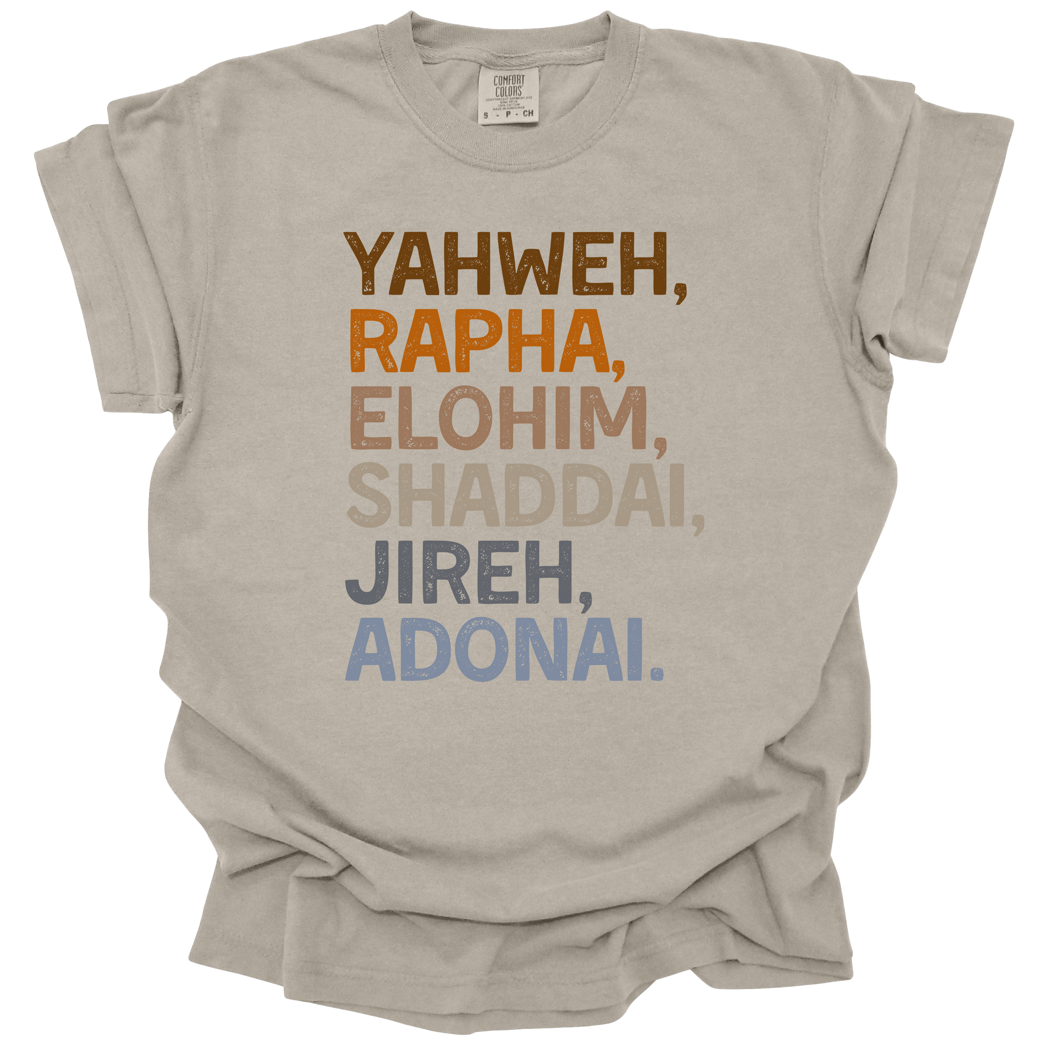 Names of God Tee in Sandstone featuring Yahweh, Rapha, Elohim, Shaddai, Jireh, and Adonai in bold typography. Oversized, unisex fit on a soft, pre-shrunk cotton tee.