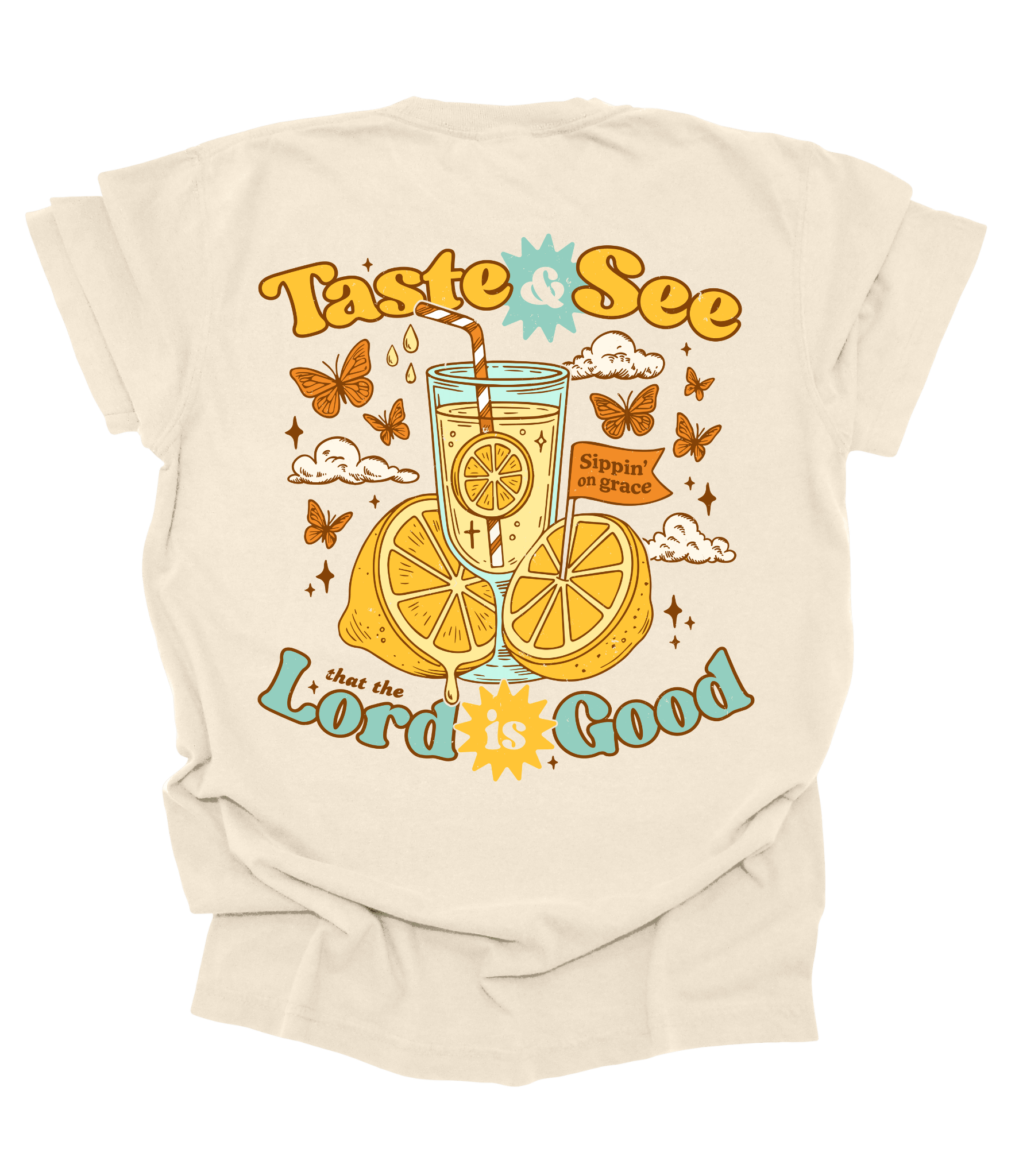 Beige t-shirt with a graphic design of a glass of  Lemonade, lemons, and butterflies on a white background.