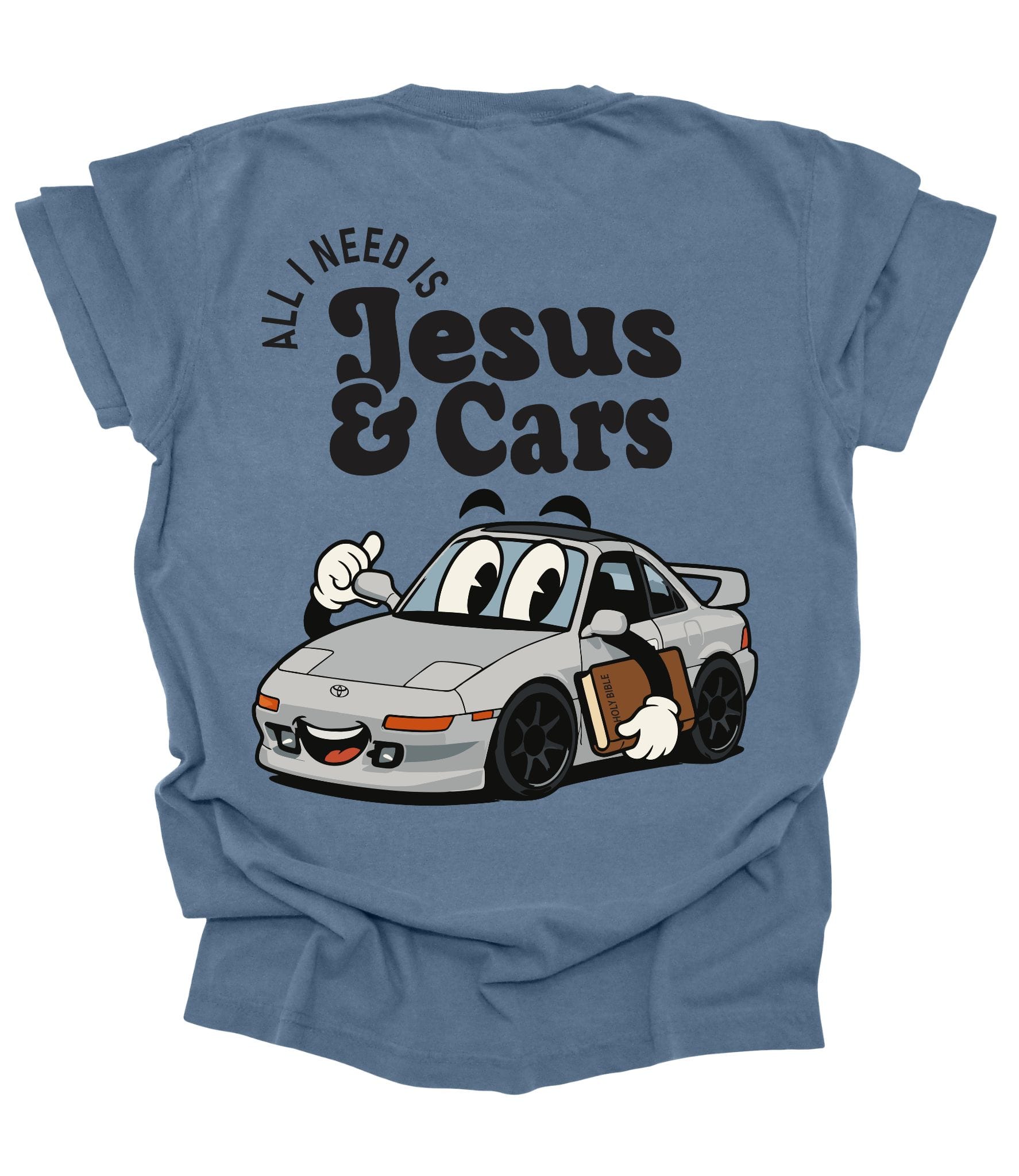 Back of blue Comfort Colors Christian t-shirt featuring a retro cartoon Toyota MR2-inspired car holding a Bible with the phrase "All I Need Is Jesus & Cars."
