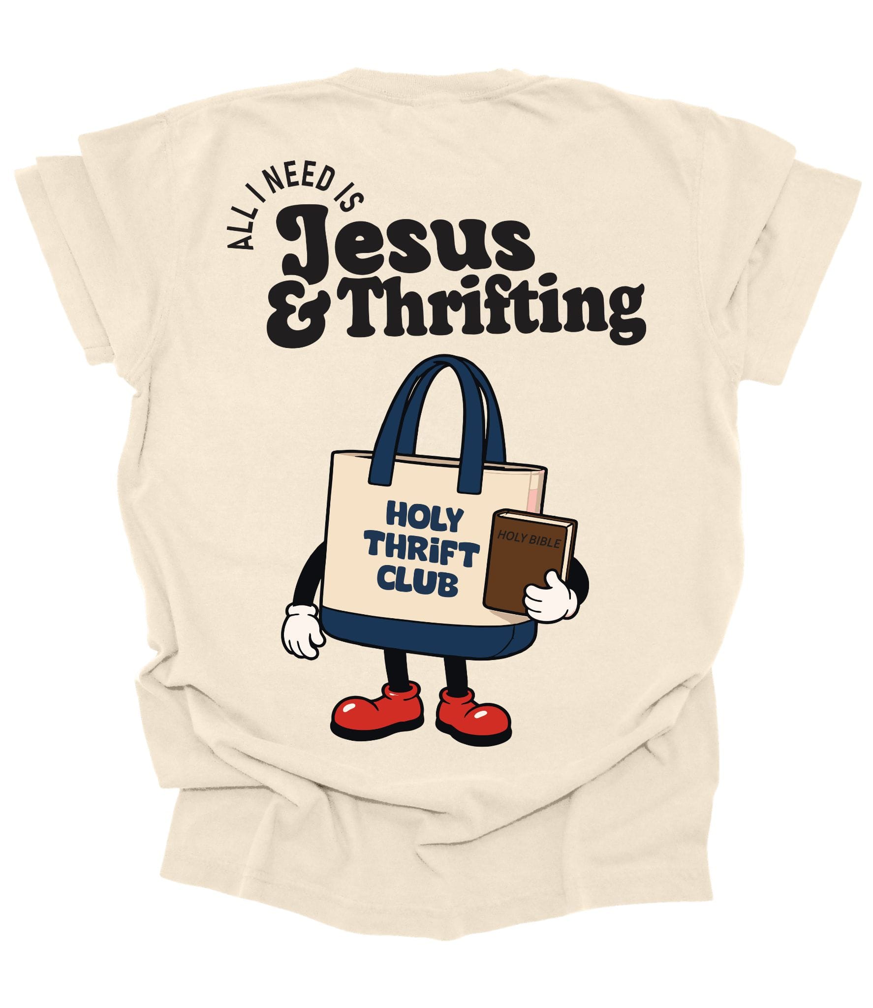 Back of ivory Comfort Colors Christian t-shirt featuring a retro tote bag character holding a Bible with the phrase "All I Need Is Jesus & Thrifting."
