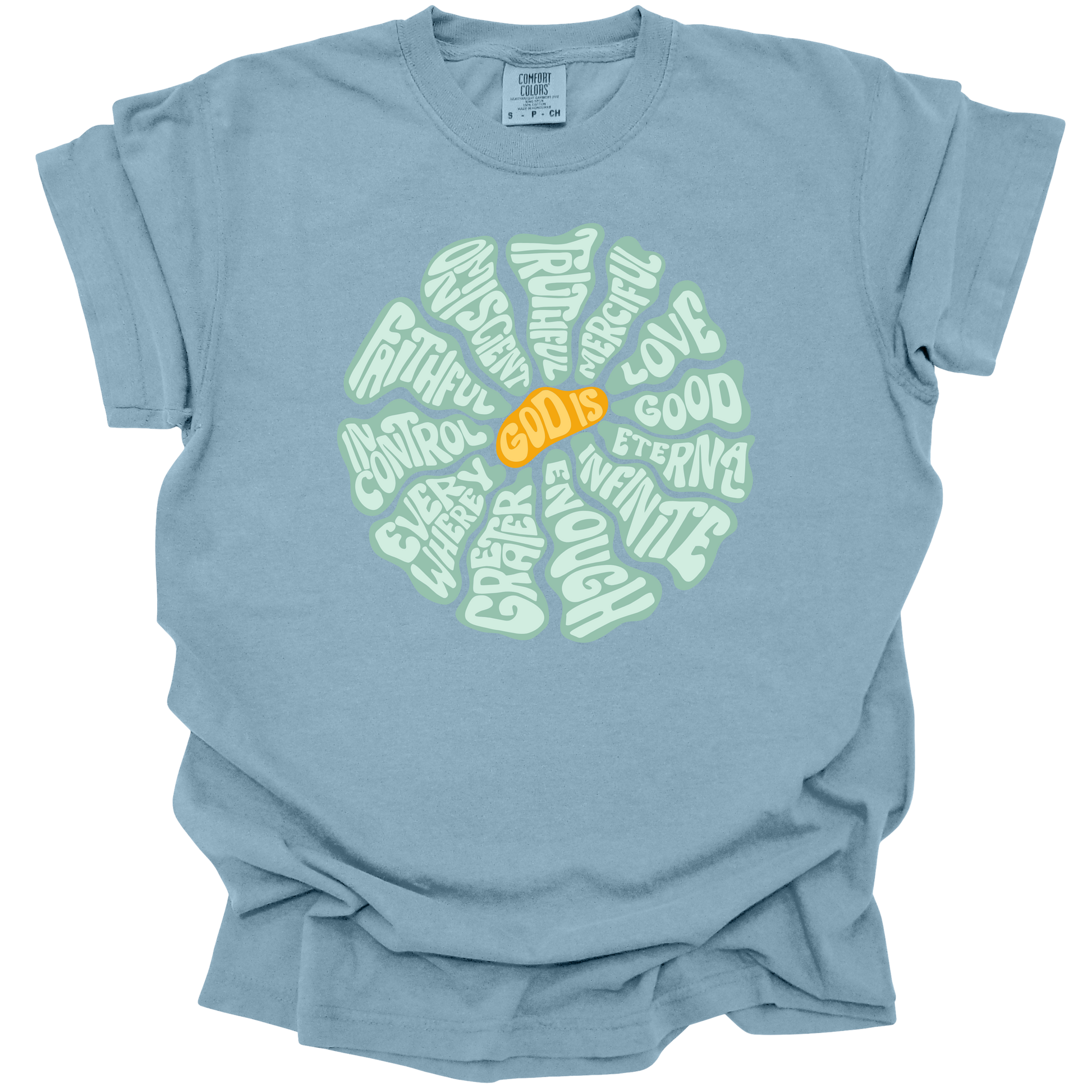 Ice Blue t-shirt with a circular, retro-inspired design featuring the attributes of God, including Faithful, Merciful, Eternal, Good, Infinite, In Control, and More, with the text "God Is" in vibrant orange at the center.