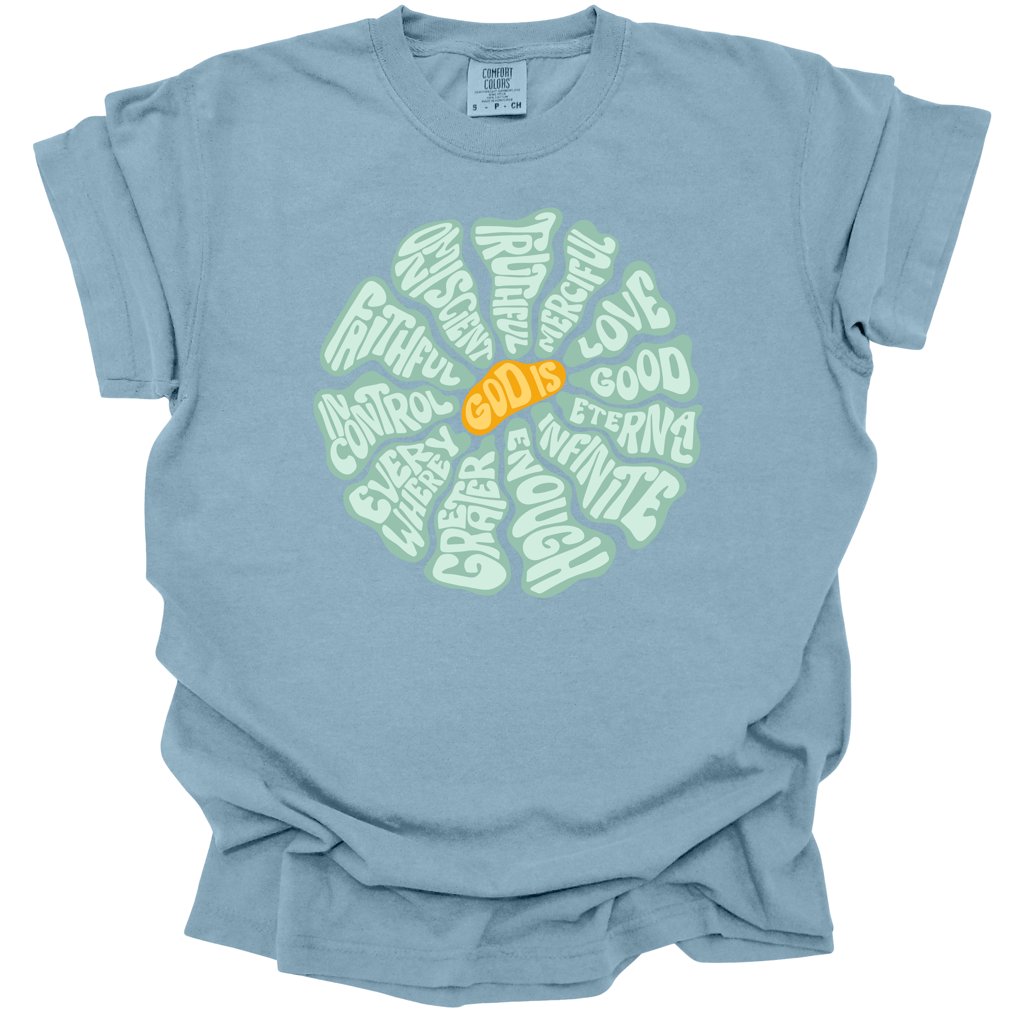 Ice Blue t-shirt with a circular, retro-inspired design featuring the attributes of God, including Faithful, Merciful, Eternal, Good, Infinite, In Control, and More, with the text "God Is" in vibrant orange at the center.