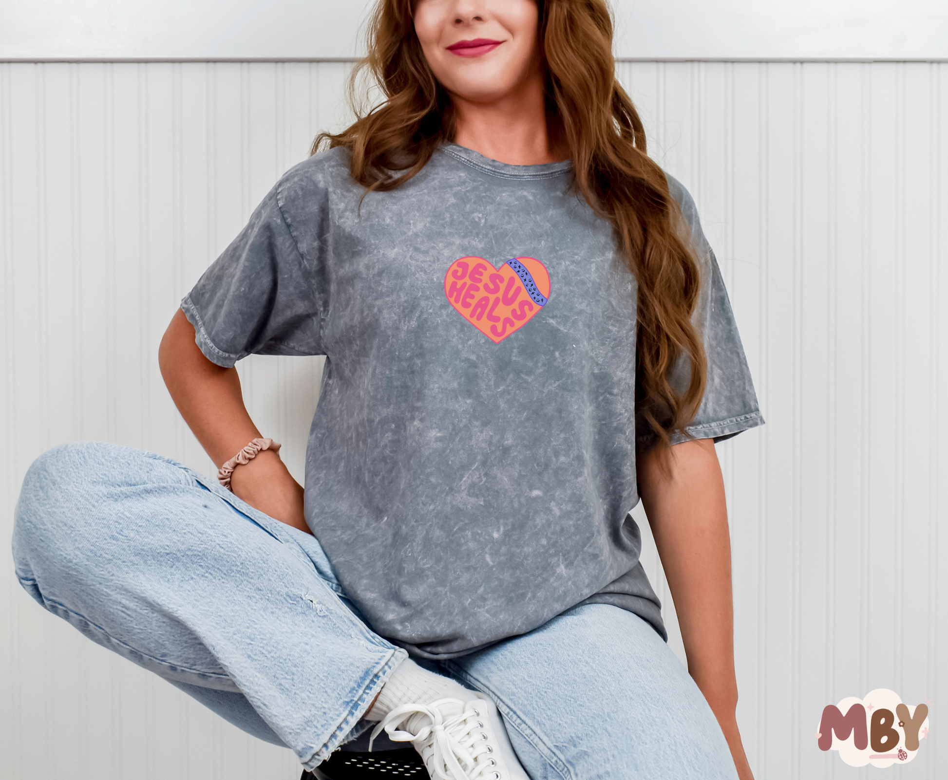 Jesus Heals - MADE BY YENJesus Heals T-Shirt featuring a bold faith-inspired design, perfect for sharing the message of Christ's healing power. Comfortable unisex Christian apparel made from a soft cotton-poly blend, ideal for casual wear, church events, or worship nights. Handmade by Made by Yen to inspire hope and faith in God's grace