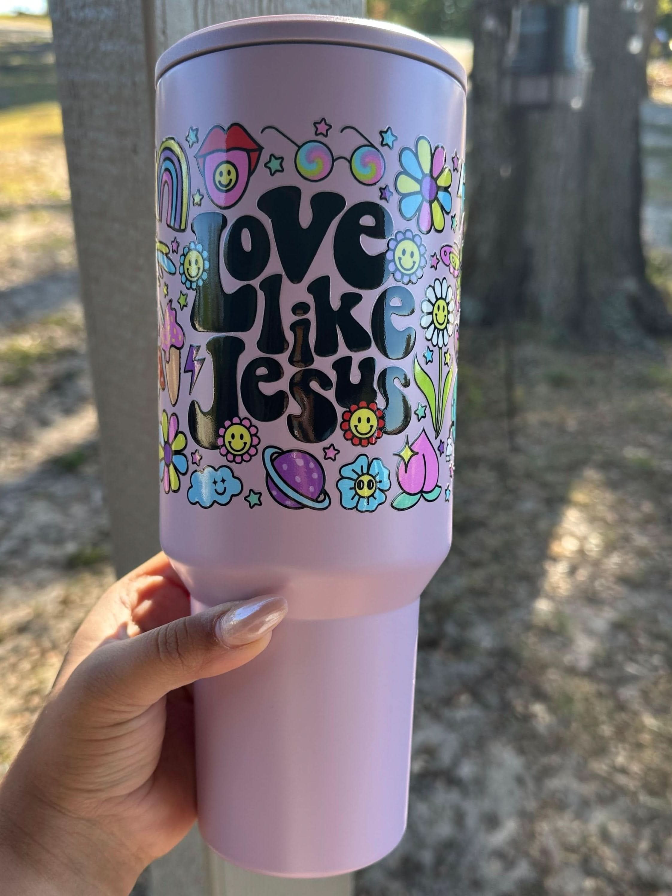 Love Like Jesus 40 oz tumbler with inspirational faith-based design, perfect for staying hydrated while spreading the message of Christ's love. Durable, stainless steel tumbler with double-wall insulation for hot and cold beverages, ideal for Christians, prayer groups, and faith-inspired gifting. Shop Made by Yen for handmade, faith-focused accessories.