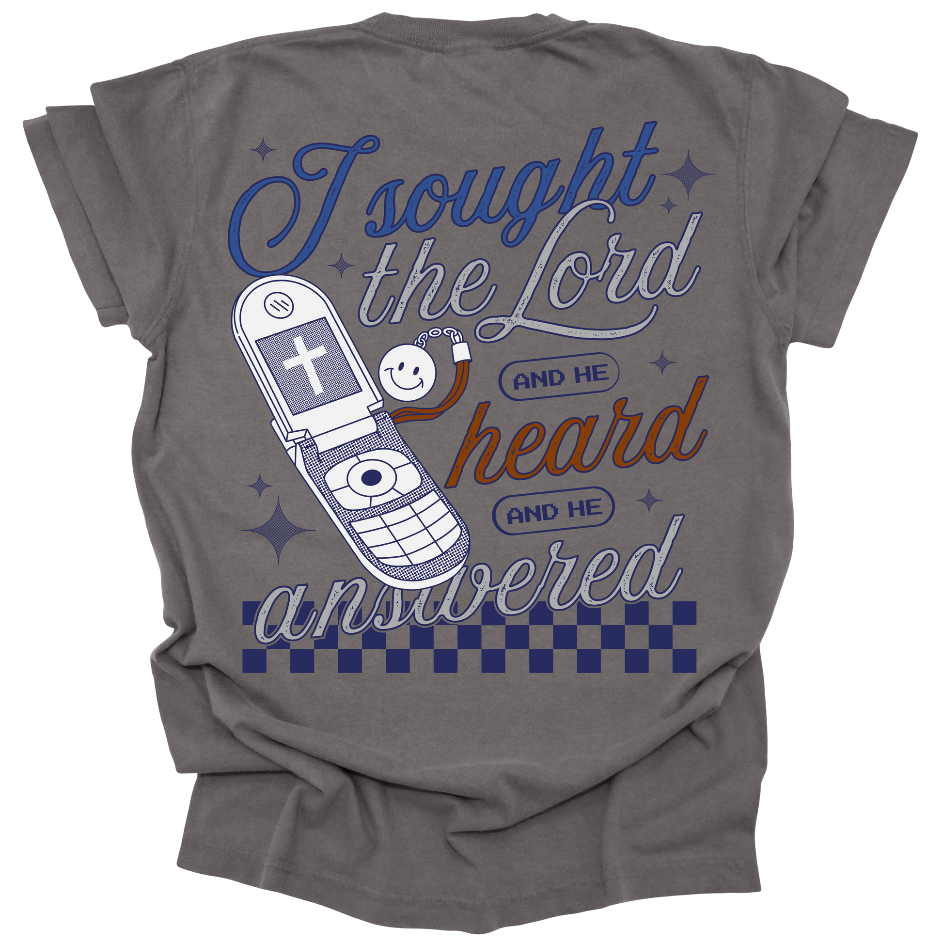 Pepper-colored t-shirt with a retro flip phone graphic and the words "I sought the Lord, and He heard and He answered," inspired by Psalm 34:4, with checkerboard accents.