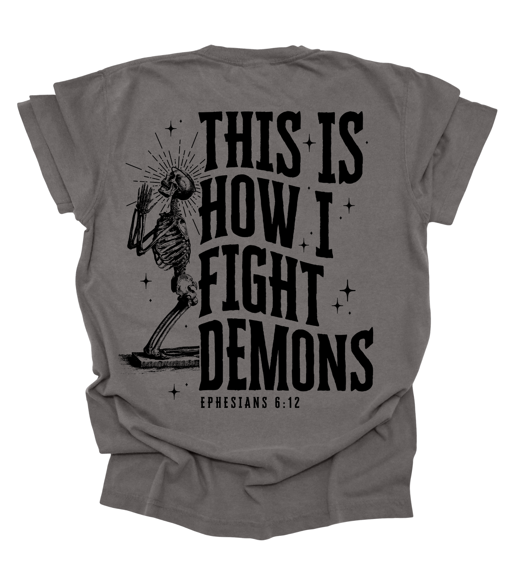 Gray t-shirt with skeleton graphic and text on a white background