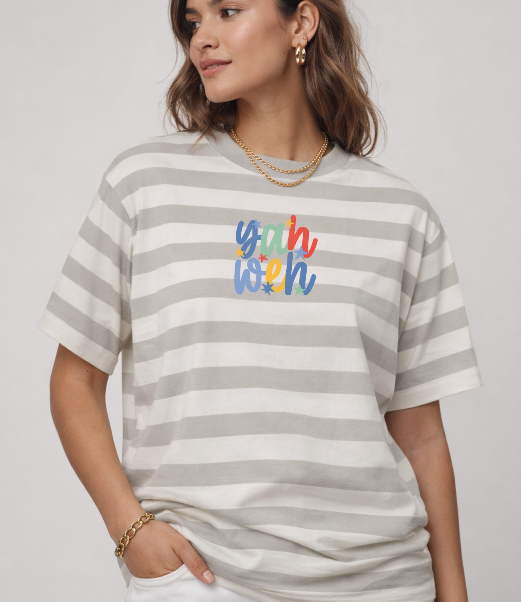 Unisex Yahweh striped T-shirt by MADE BY YEN featuring a minimalist Christian faith graphic in neutral tones.