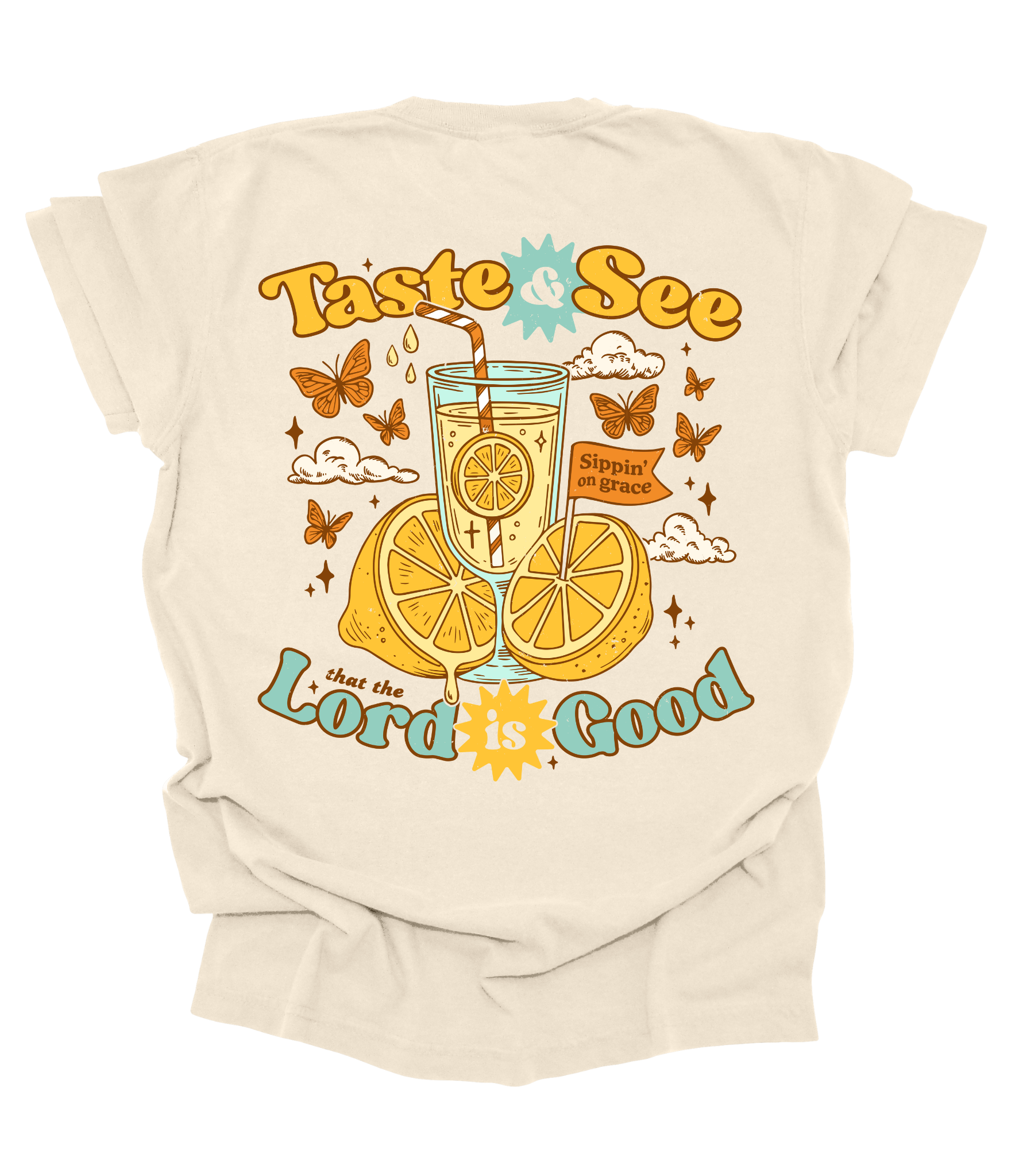 Beige t-shirt with a graphic design of a glass of  Lemonade, lemons, and butterflies on a white background.